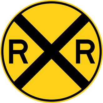 Railroad Crossing — жёлтый круг с буквами R-R и крестом