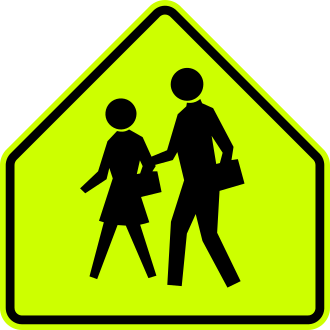 School Zone — жёлто-зелёный пятиугольник со школьниками
