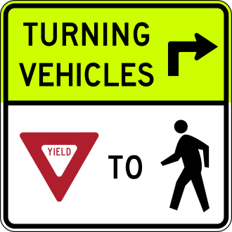 Turning vehicles yield — флуоресцентный знак уступи поворачивающим